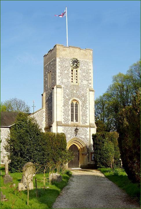 Stands the clock at half past three.  The church path and tower.